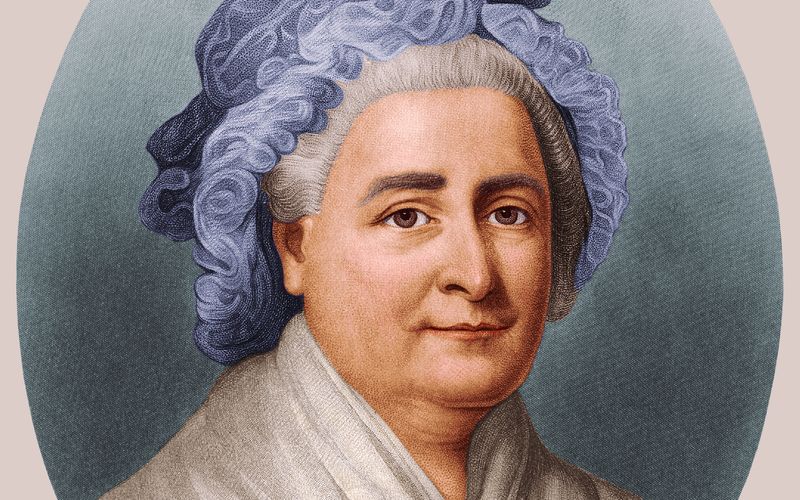 Martha Washington, die erste First Lady überhaupt. Zu ihrer Zeit, also im späten 18. Jahrhundert, hielten Frauen sich noch aus der Politik heraus. Trotzdem blickt man in der amerikanischen Geschichtsschreibung bis heute mit Ehrfurcht auf sie zurück. Stiftungen und Krankenhäuser wurden nach ihr benannt, außerdem war Lady Washington die erste Frau, die auf einer US-Briefmarke verewigt wurde.