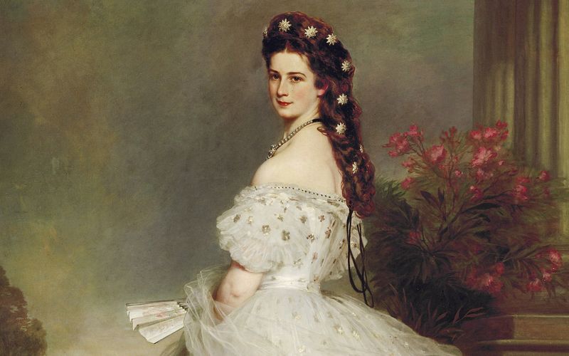 Prinzessin Elisabeth in Bayern wurde am 24. Dezember 1837 in München geboren. Durch ihre Heirat mit Kaiser Franz Joseph I. wurde sie 1854 zur Kaiserin von Österreich. Ihre besondere Lebensgeschichte machte die Frau zu einer Legende. Heute kennt man sie vor allem durch das hier abgebildete Gemälde von Franz Xaver Winterhalter aus dem Jahr 1865.