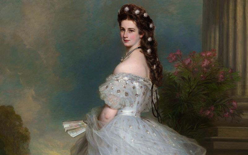 Prinzessin Elisabeth in Bayern wurde am 24. Dezember 1837 in München geboren. Durch ihre Heirat mit Kaiser Franz Joseph I. wurde sie 1854 zur Kaiserin von Österreich. Ihre besondere Lebensgeschichte machte die Frau zu einer Legende. Heute kennt man sie vor allem durch das hier abgebildete Gemälde von Franz Xaver Winterhalter aus dem Jahr 1865.
